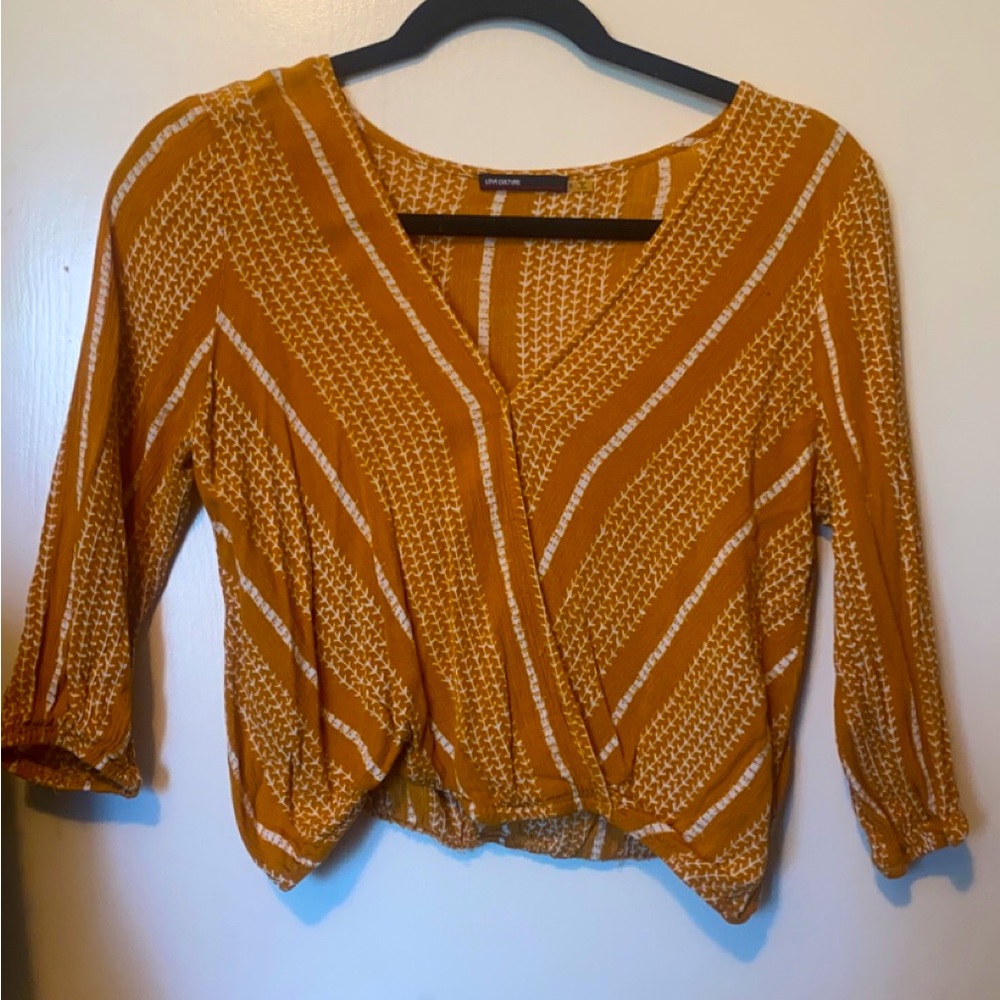 Cropped Aztec print blouse